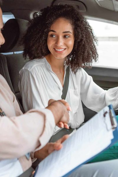 instructor-handshaking-with-driver-lady-after-succ-2023-05-11-20-24-41-utc.jpg
